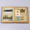 Äldre album med vykort och gratulationskort