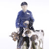 Figurin, dräng med kalvar, Royal Copenhagen, höjd 23,5 cm