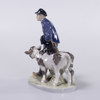 Figurin, dräng med kalvar, Royal Copenhagen, höjd 23,5 cm