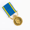 Medalj, 23k/18k guld, vikt 16,6 gram