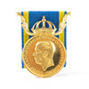 Medalj, 23k/18k guld, vikt 16,6 gram