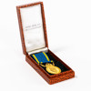 Förtjänstmedalj, 23k/18k guld diameter 27 mm