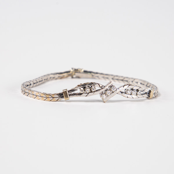 Armband, 18k vitguld, med 9 st briljanter 0,31 ct, längd 20 cm